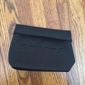 SKIMS Black Neoprene Pouch
